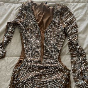 Nude ball gown with slit